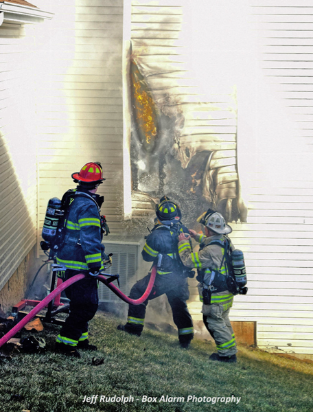 Firefighters fight house fire