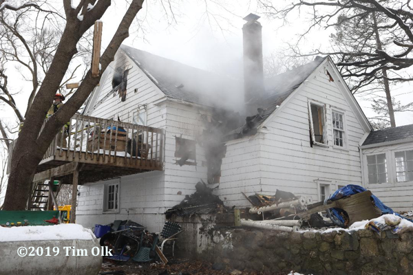 house badly damaged by fire