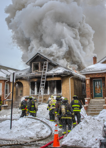 fire engulfs a Chicago bungalow in frigid weather