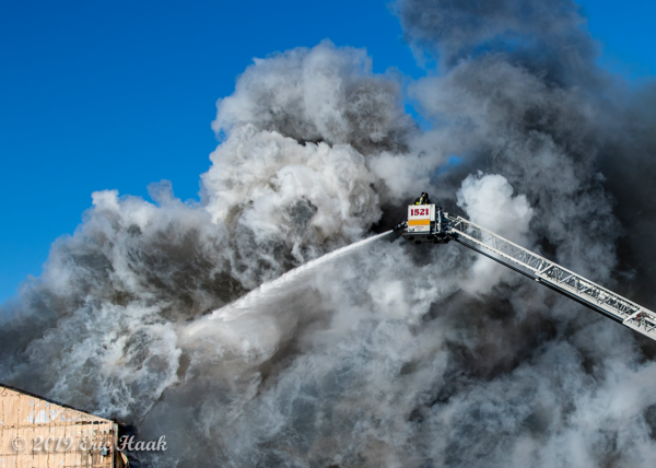massive smoke and frozen steam at fire scene