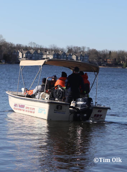 fire department divers search a lake
