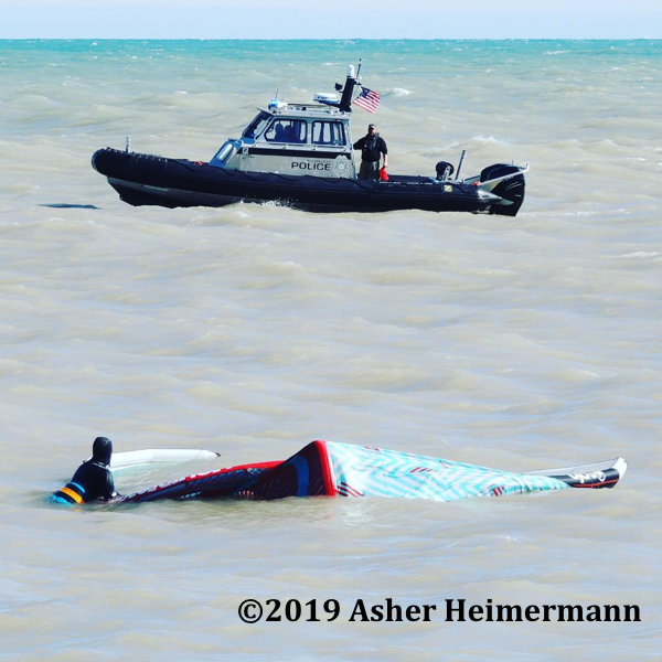 Milwaukee Police Department Marine UNit with kite surfer in distress 