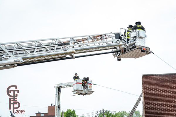 Chicago FD Snorkel and tower ladder at work