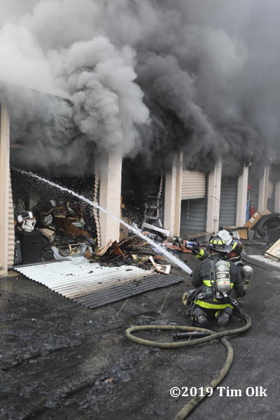 Firefighters battle fire in a self storage facility