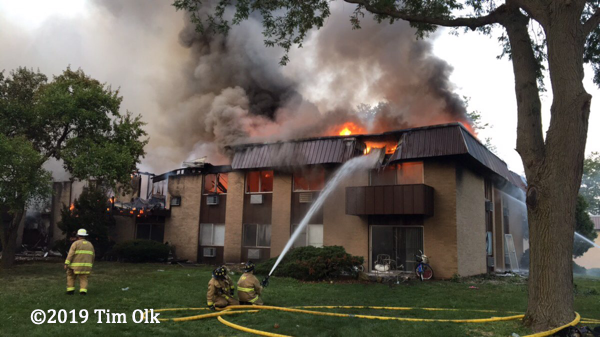 heavy fire destroys apartment building