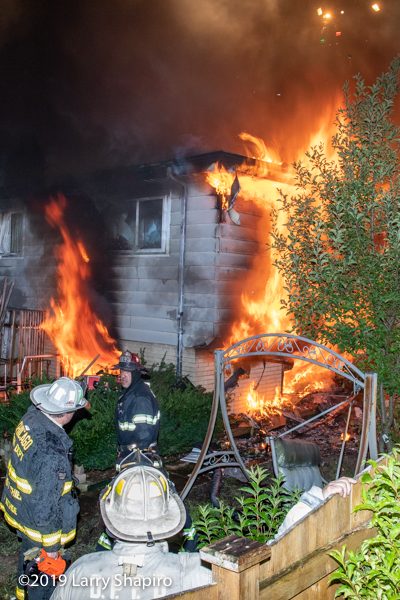 flames engulf house