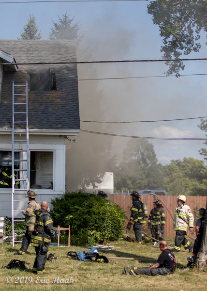 Firefighters at house fire