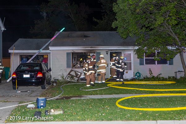 Firefighters at house fire