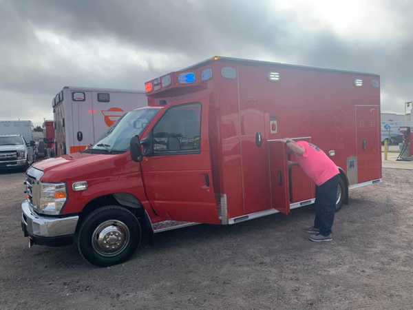 Firefighters inspect new ambulance 