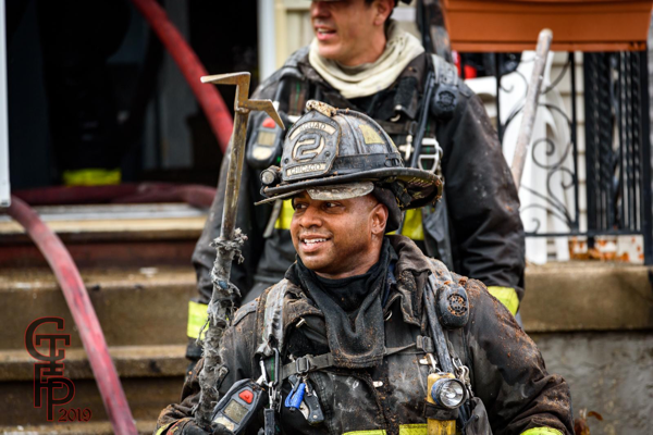 Firefighter with dirty face after a fire