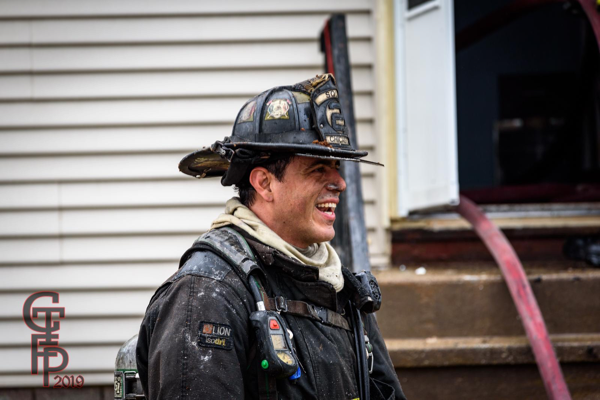 Firefighter with dirty face after a fire