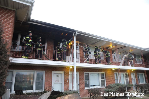 Firefighters overhaul after apartment fire