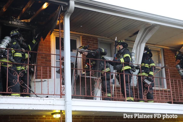 Firefighters overhaul after apartment fire