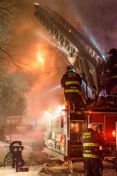 Chicago Firefighters battle a fire in the winter