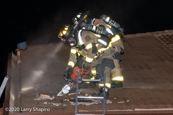 Firefighters use saw to vent roof