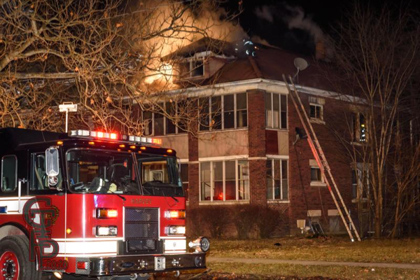 fire through the roof of an attic in Harvey IL
