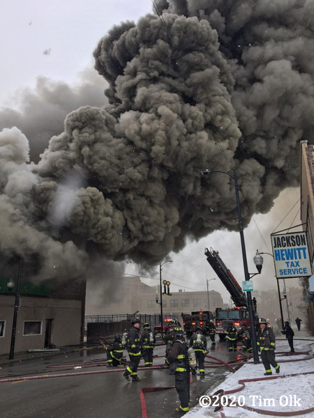 massive smoke from commercial building fire