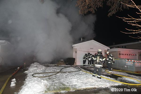 smoke from house on fire at night