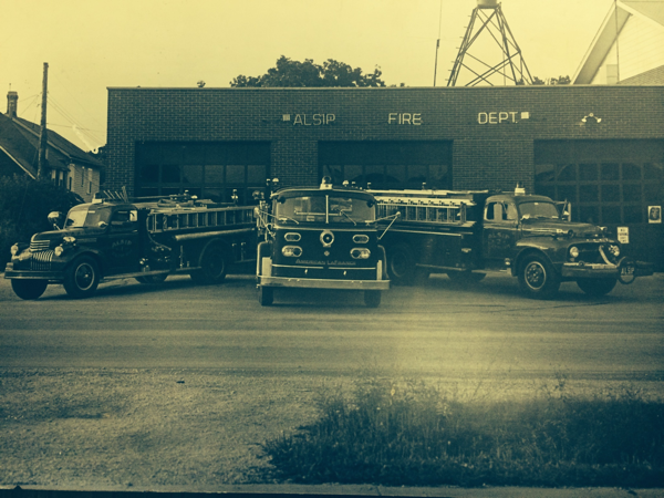 Historic photo of the Alsip FD fire trucks