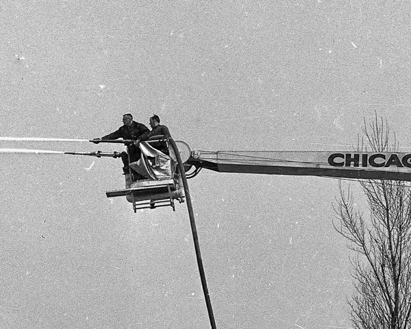 Vintage photo from April 19, 1961 of Chicago FD Sni=orkel 2 testing a second gun in the basket