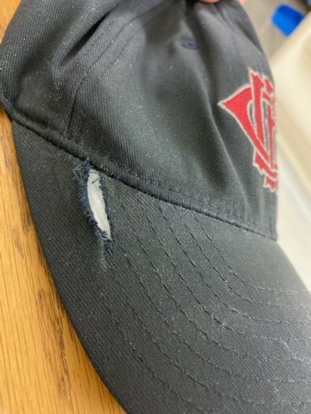 bullet hole in the hat of a Chicago FD paramedic