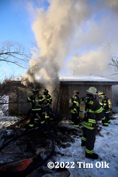 Firefighters at the scene of a house fire in Northbrook, IL