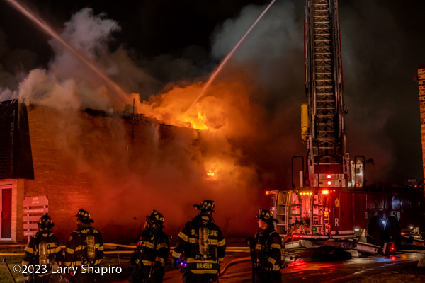 Firefighters battle a commercial building fire. Larry Shapiro photo
