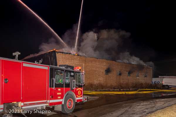 Firefighters battle a commercial building fire. Larry Shapiro photo