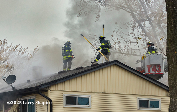 #chicagoareafire.com; #larryshapiro; #larryshapiro.tumblr.com; #larryshapiroblog.com; #shapirophotography.net; #firescene; #WheelinbgFD; #housefire; #venting; #smoke; #firefighters;